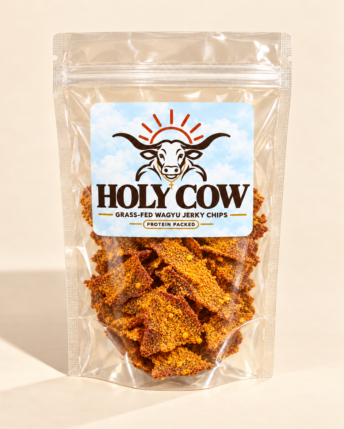 Elote jerky chips visible through a clear pouch with a cloudy blue Holy Cow label